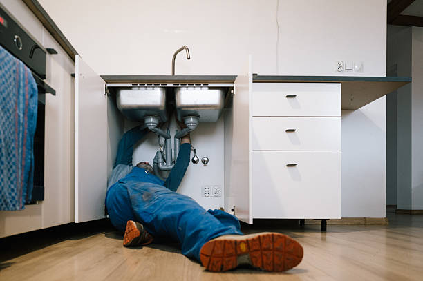 Professional Plumbing technician working in Old Bethpage, NY